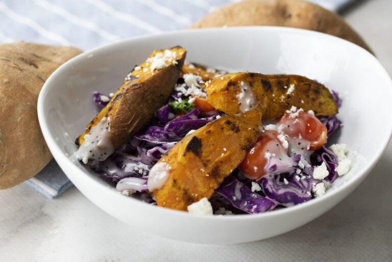 Sweetpotato wedge and purple cabbage salad with poppyseed dressing